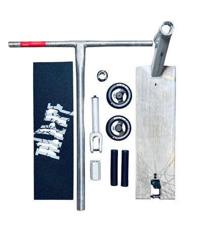 Collection of scooter  parts including a stem, headset, and components on a gray surface.